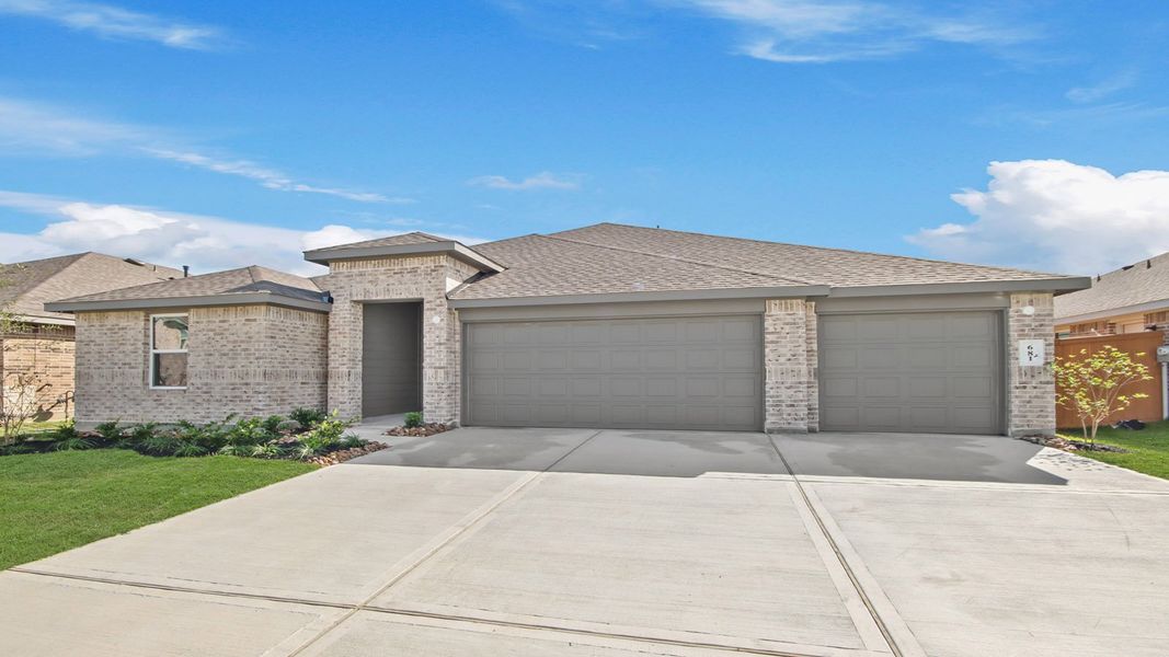 Front exterior of a new home in River Ranch Meadows, Dayton, TX, highlighting curb appeal (Image 2). Front exterior of a new home in River Ranch Meadows, Dayton, TX, highlighting curb appeal (Image 2).