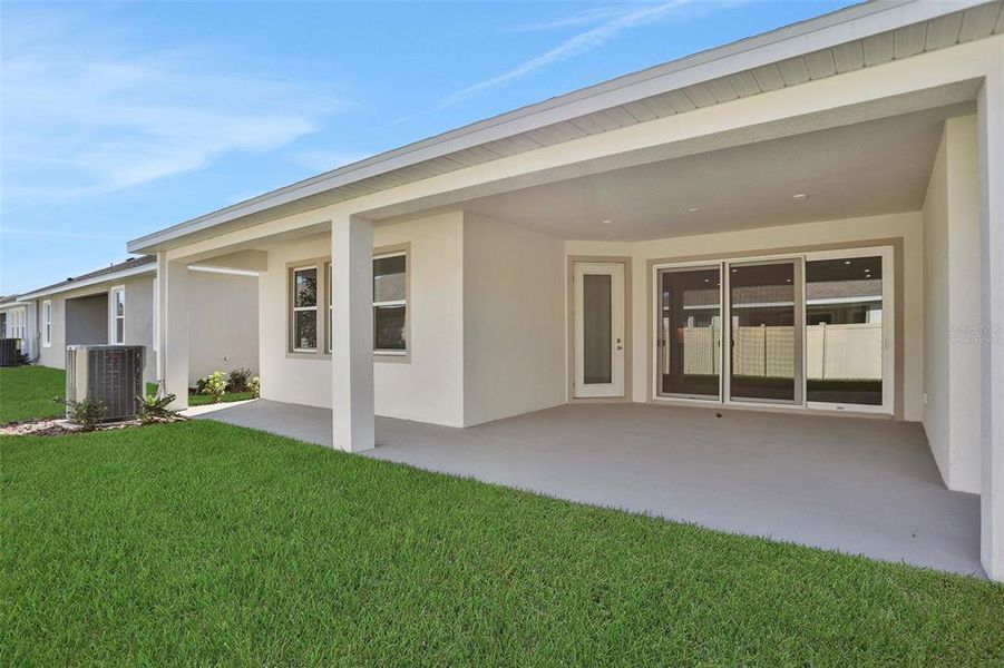 Exterior details and patio area of a home in Angeline, Land O' Lakes (Image 4).