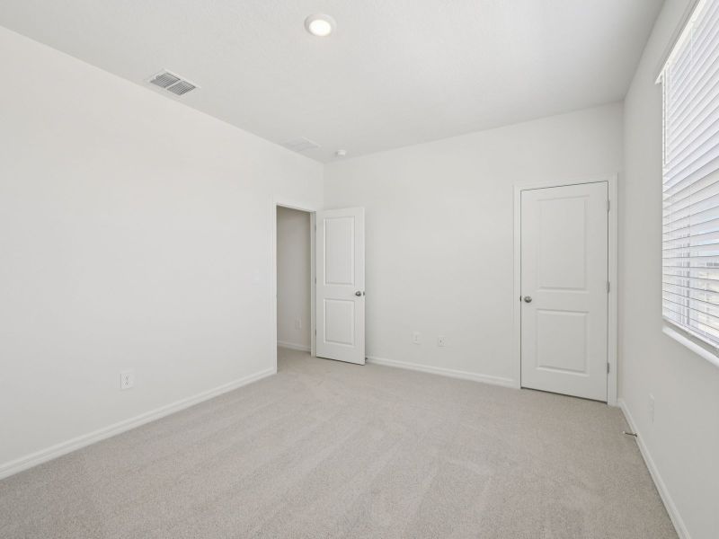 Spacious, unfurnished interior of a new home in Coasterra - Reserve Series, Palmetto (Image 18).