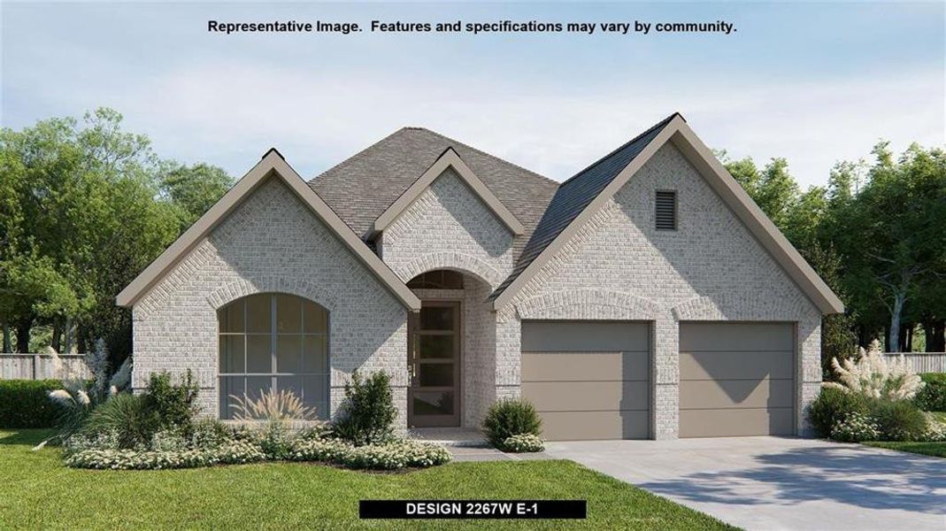 View of front of home with a garage and a front yard