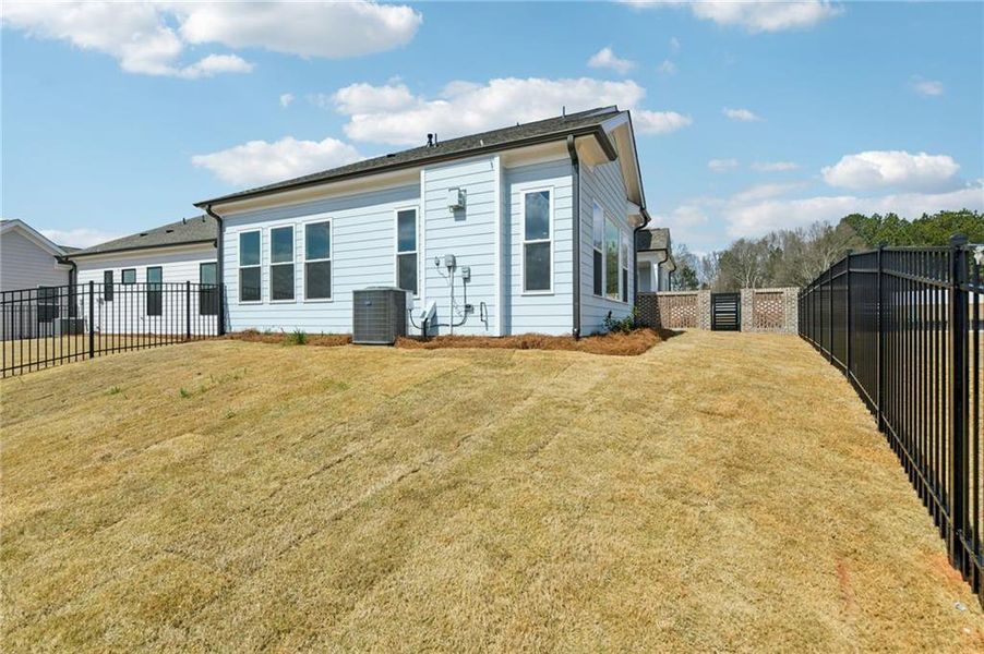 Exterior details and patio area of a home in Aberdeen, Hoschton (Image 29).