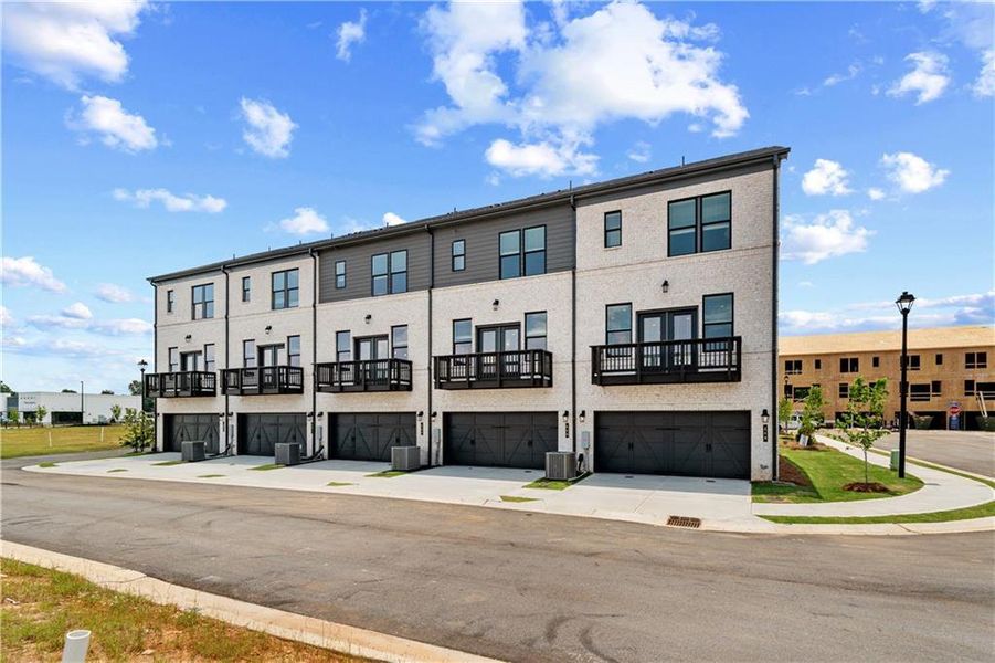 Front exterior of a new home in Silverock, McDonough, GA, highlighting curb appeal (Image 19).