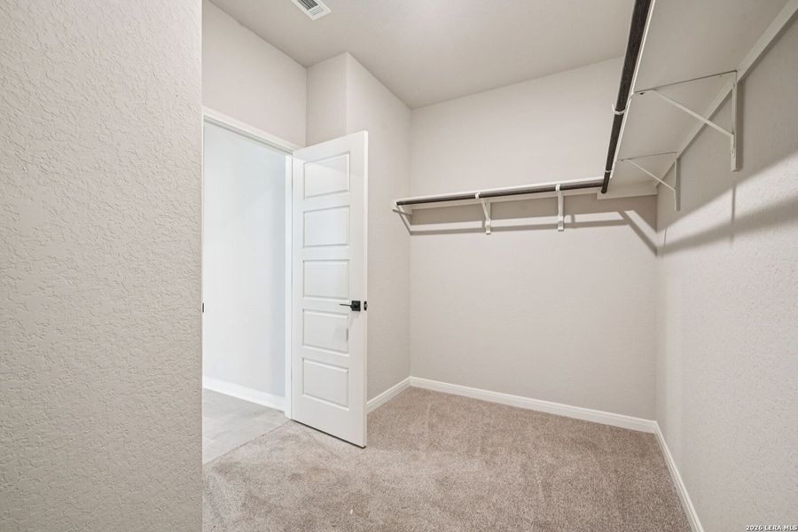 Spacious, unfurnished interior of a new home in Estancia Ranch - Classic Series, San Antonio (Image 23).