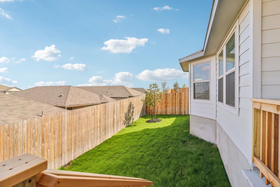 Back exterior of the Briscoe floorplan at a Meritage Homes community.