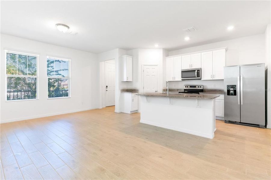 Furnished interior view inside a new home in The Meadow at Crossprairie Bungalows, St. Cloud (Image 3).