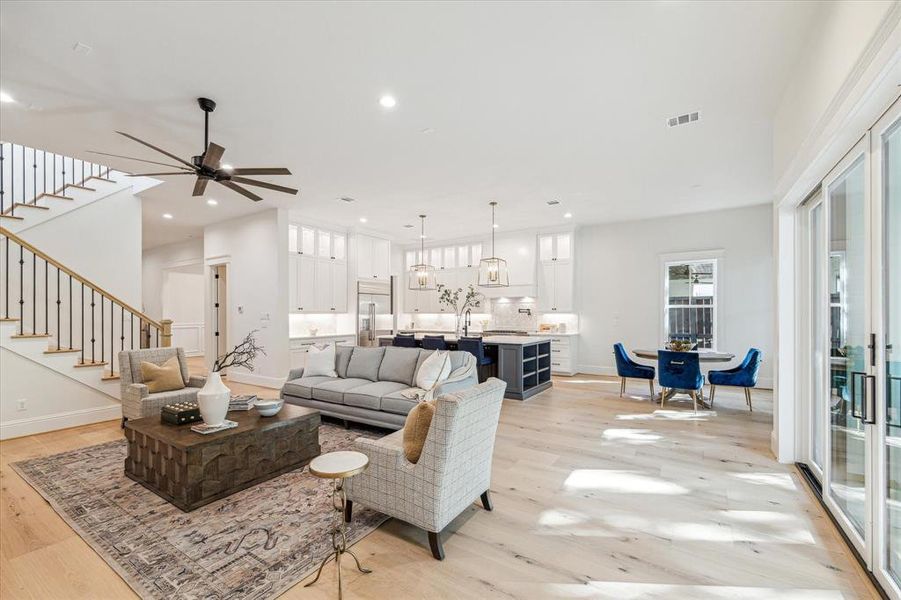 Living room is light and bright and is open to the kitchen and breakfast area