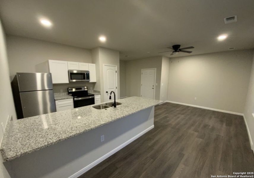 Furnished interior view inside a new home in , San Antonio (Image 4).