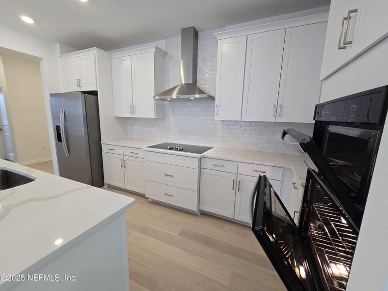 Furnished interior view inside a new home in Hyland Trail, Middleburg (Image 6).