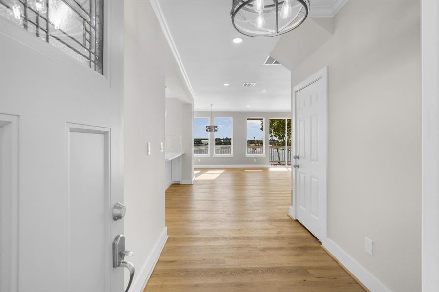 Light and bright entryway- fresh paint, luxury vinyl floorings, wall of windows letting in natural light and breathtaking water front views! Light and bright entryway- fresh paint, luxury vinyl floorings, wall of windows letting in natural light and breathtaking water front views!