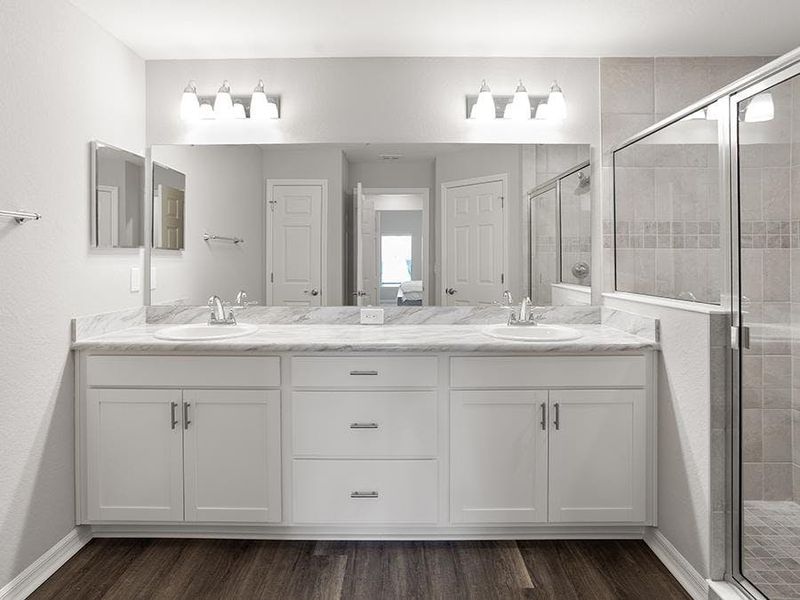 And, it is completed by a large en-suite bath with a linen closet.