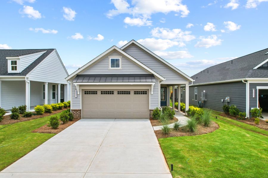 Front exterior of a new home in Carolina Riverside, Belmont, NC, highlighting curb appeal (Image 37). Front exterior of a new home in Carolina Riverside, Belmont, NC, highlighting curb appeal (Image 37).