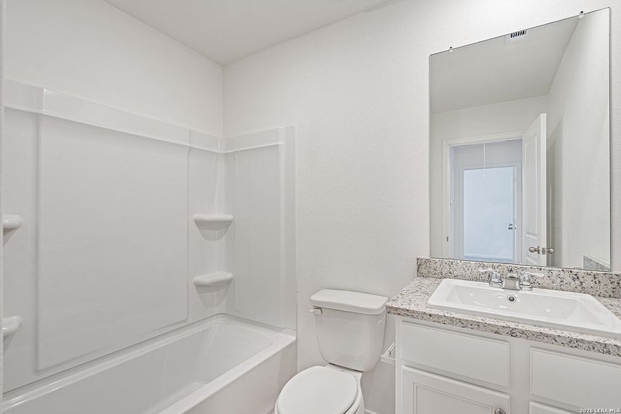 Furnished interior view inside a new home in Preserve at Medina, Von Ormy (Image 3).