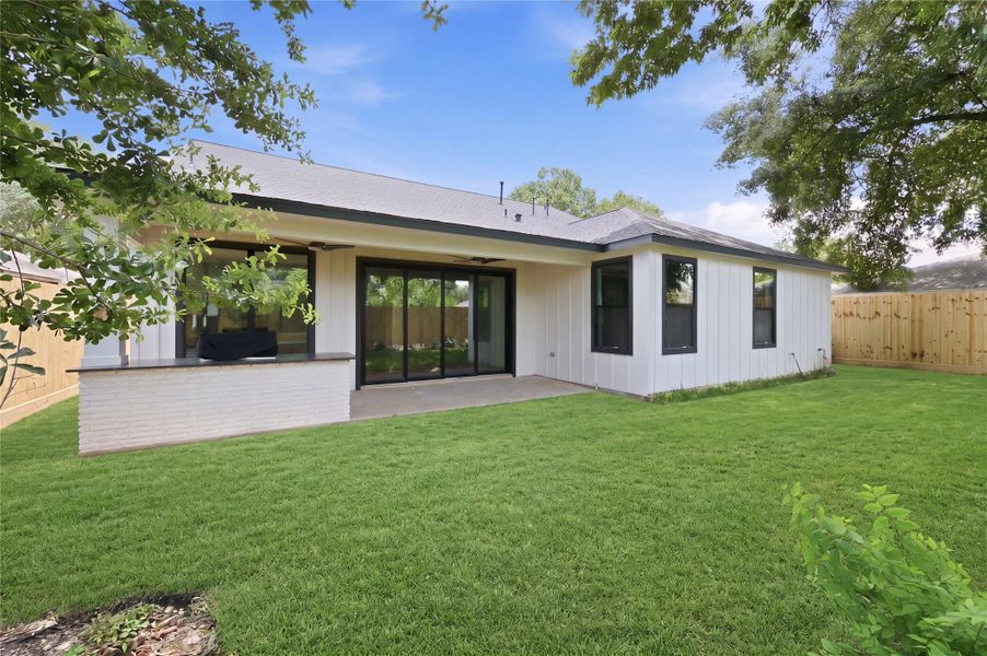 Exterior details and patio area of a home in , Houston (Image 3).