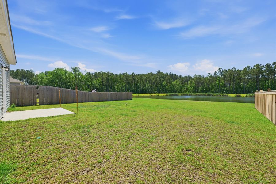 Exterior details and patio area of a home in Pender Woods at Cane Bay, Summerville (Image 4). Exterior details and patio area of a home in Pender Woods at Cane Bay, Summerville (Image 4).