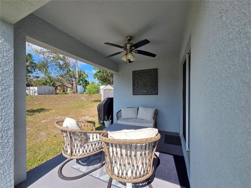 Exterior details and patio area of a home in Hernando County Spot Lots, Spring Hill (Image 28).