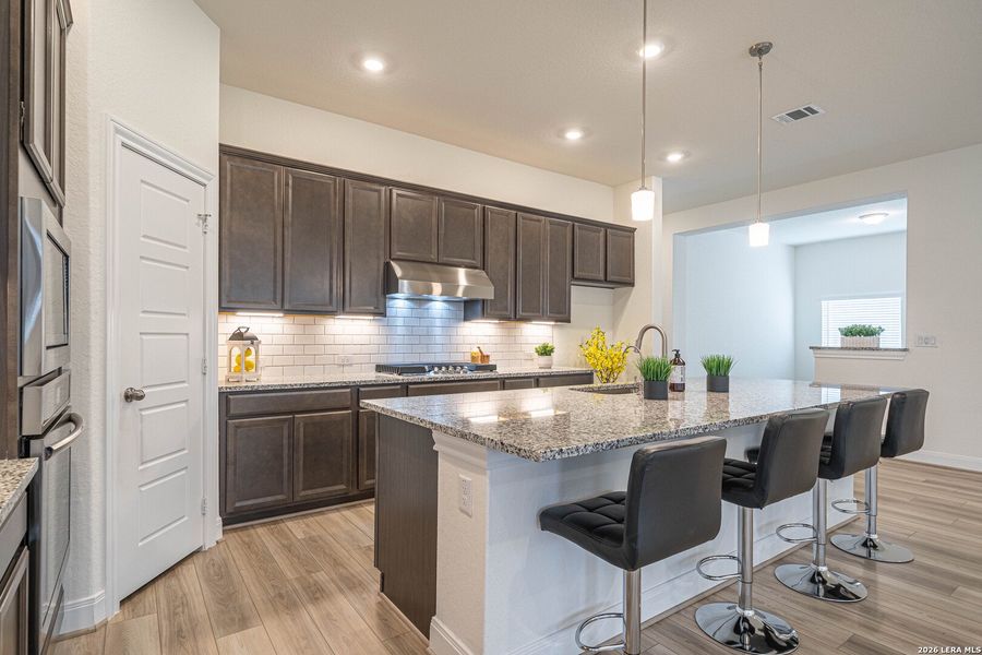 Furnished interior view inside a new home in Ladera - Laurel Hollow 60', San Antonio (Image 20).