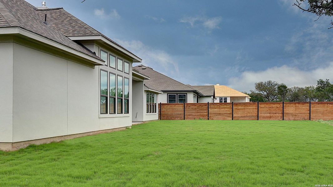 Exterior details and patio area of a home in Megan's Landing, Castroville (Image 25).