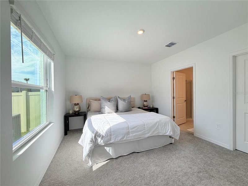 Furnished interior view inside a new home in Westview Community Group Page, Kissimmee (Image 29).