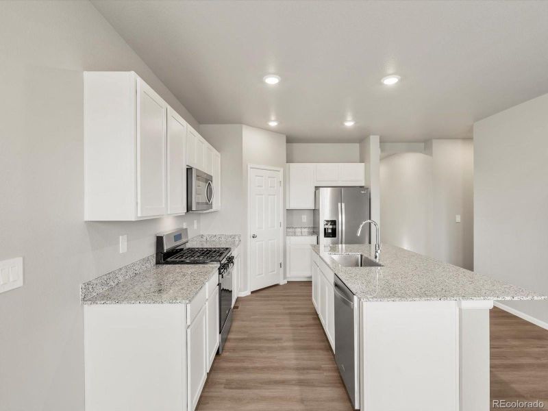 Furnished interior view inside a new home in , Commerce City (Image 13).