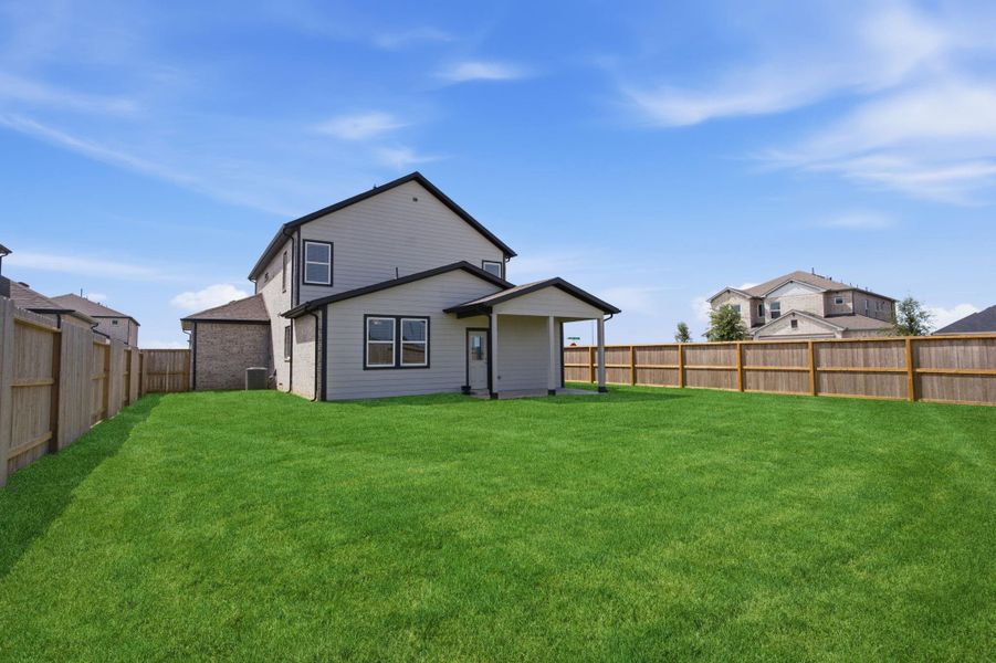 Exterior details and patio area of a home in , Iowa Colony (Image 27).