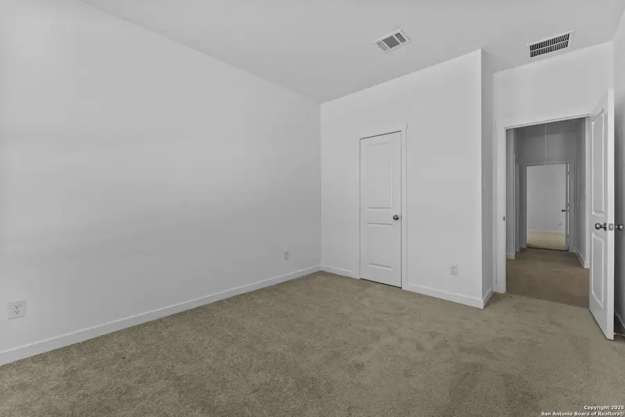 Spacious, unfurnished interior of a new home in Waterwheel: Coastline Collection, San Antonio (Image 10).