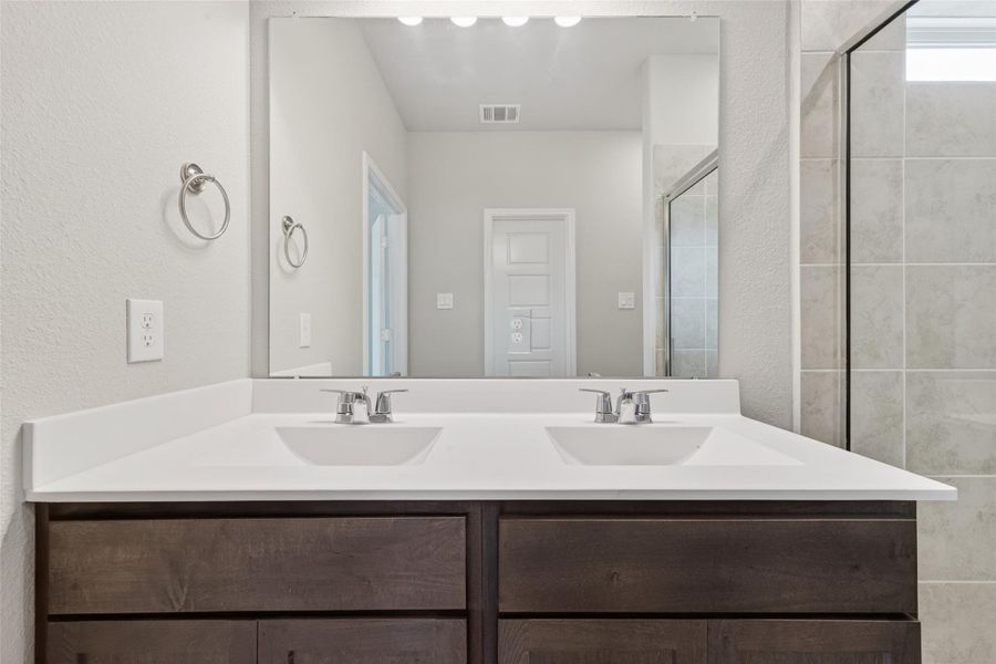 Close-up of interior finishes inside a home in Sunterra, Katy (Image 21).
