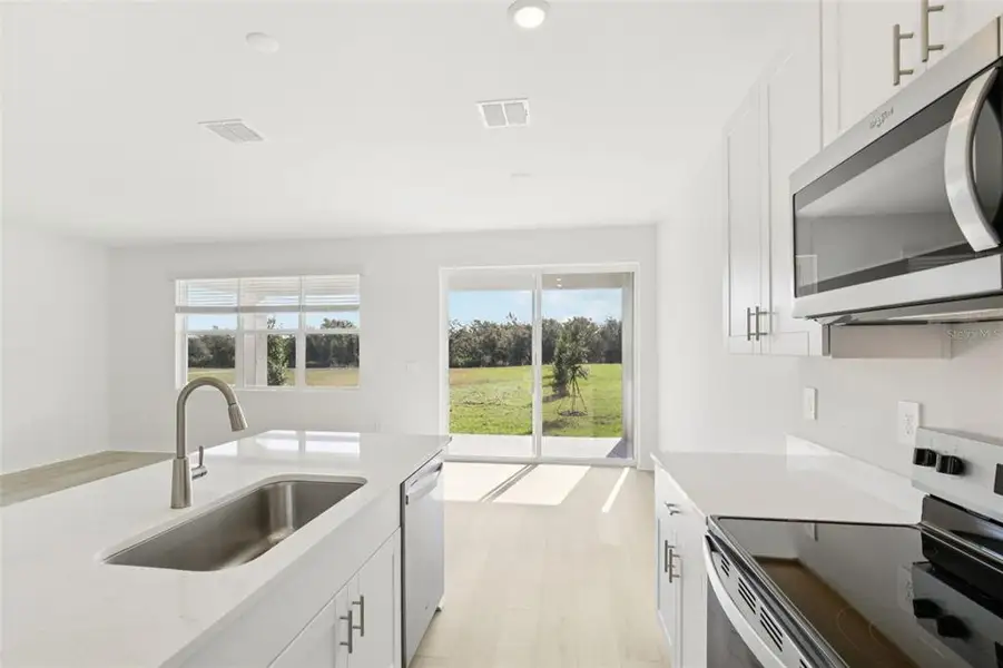 Furnished interior view inside a new home in Coasterra - Reserve Series, Palmetto (Image 5).