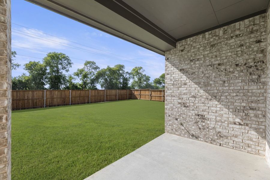 Exterior details and patio area of a home in River Ranch, Van Alstyne (Image 3).