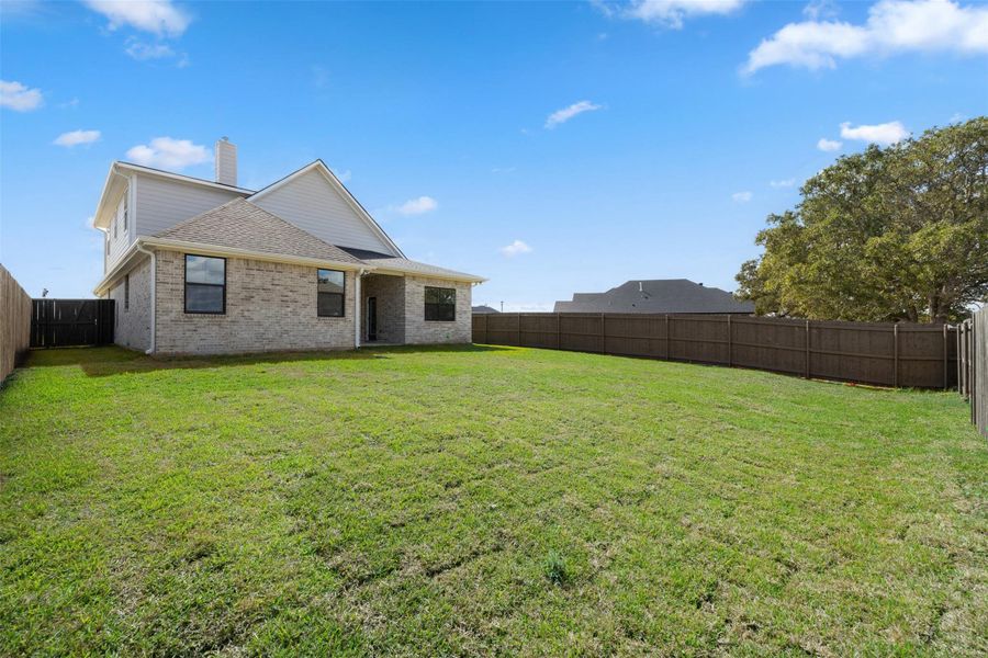 Exterior details and patio area of a home in , Bryan (Image 21). Exterior details and patio area of a home in , Bryan (Image 21).