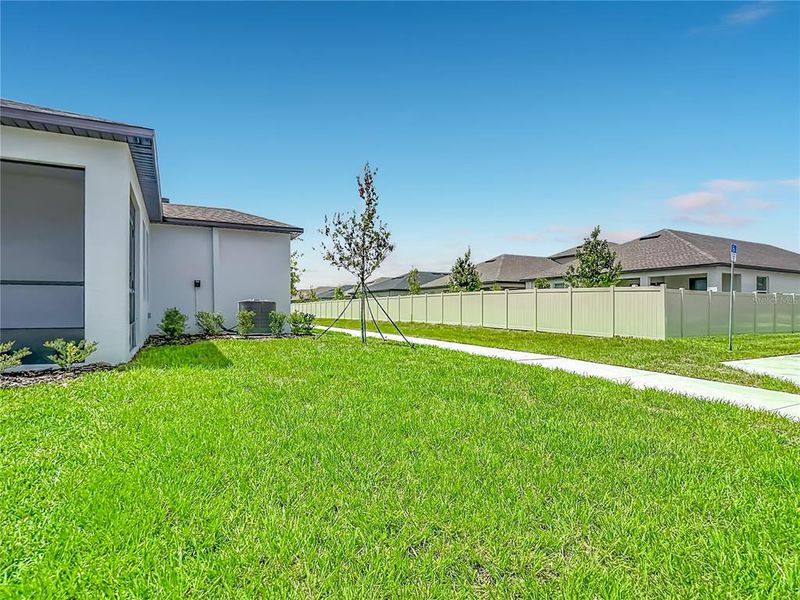 Exterior details and patio area of a home in New Port Corners Active Adult, New Port Richey (Image 4). Exterior details and patio area of a home in New Port Corners Active Adult, New Port Richey (Image 4).