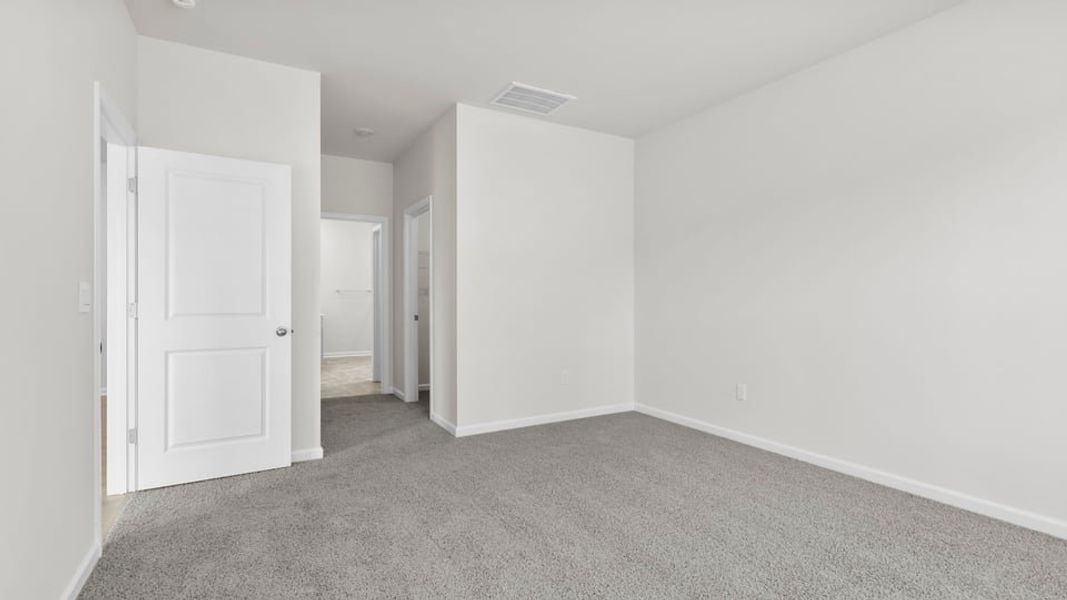 Spacious, unfurnished interior of a new home in Durbin Meadows Traditions, Fountain Inn (Image 28).