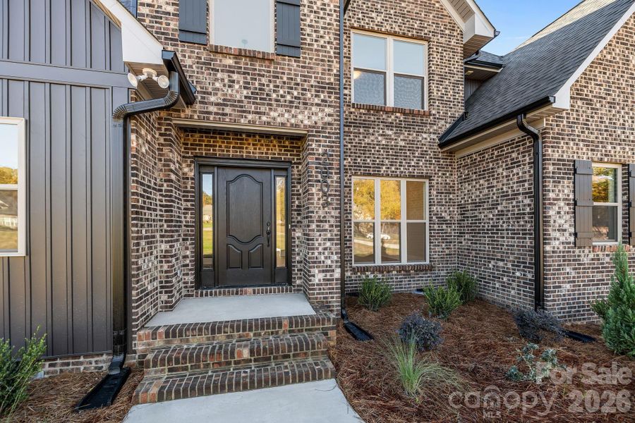 Exterior details and patio area of a home in , Monroe (Image 3).
