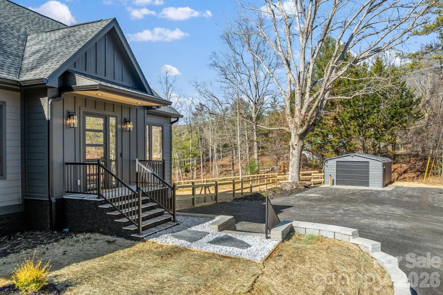 Exterior details and patio area of a home in , Fletcher (Image 3).