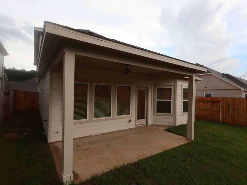 Front exterior of a new home in Lone Star Landing, Montgomery, TX, highlighting curb appeal (Image 20). Front exterior of a new home in Lone Star Landing, Montgomery, TX, highlighting curb appeal (Image 20).