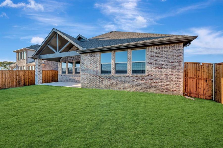Exterior details and patio area of a home in Timberbrook, Justin (Image 2). Exterior details and patio area of a home in Timberbrook, Justin (Image 2).