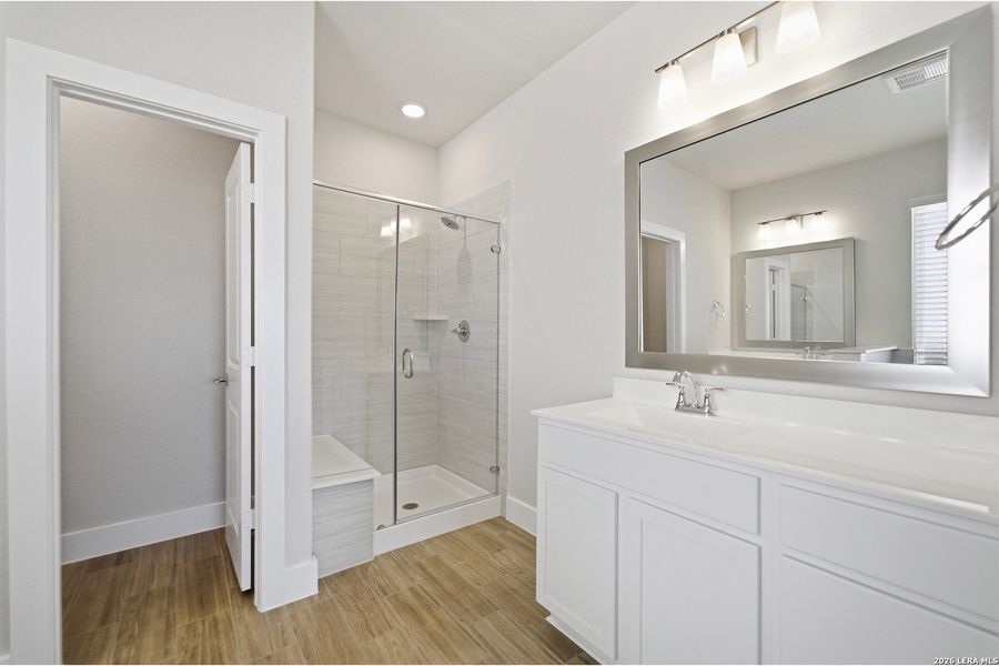 Furnished interior view inside a new home in The Woodlands at Medina Hills, Mico (Image 11).