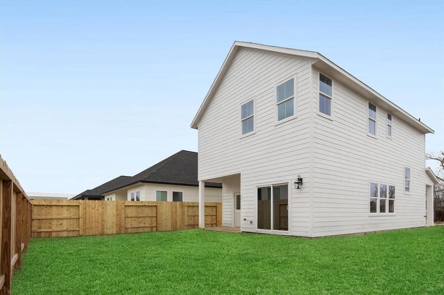 Your large fully fenced backyard— complete with a covered back patio! Perfect for enjoying your outdoor space year round.