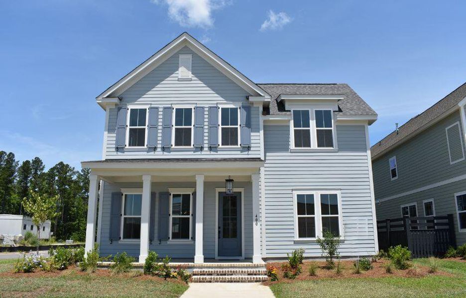 Front exterior of a new home in Nexton, Summerville, SC, highlighting curb appeal (Image 2). Front exterior of a new home in Nexton, Summerville, SC, highlighting curb appeal (Image 2).