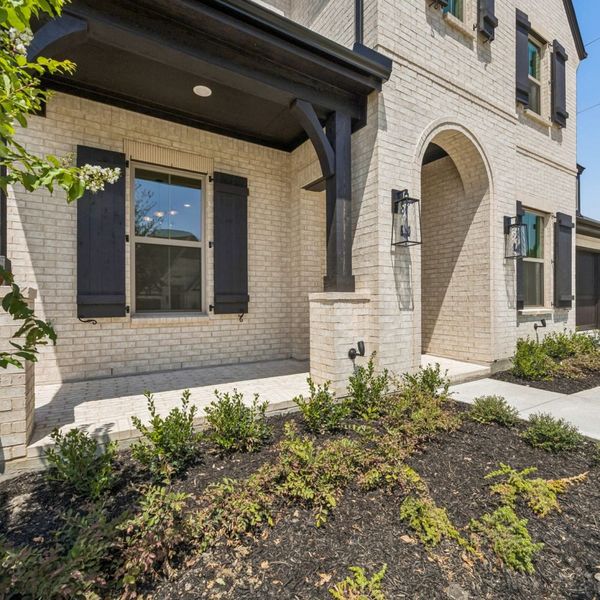 Exterior details and patio area of a home in The Parks at Wilson Creek, Celina (Image 28). Exterior details and patio area of a home in The Parks at Wilson Creek, Celina (Image 28).