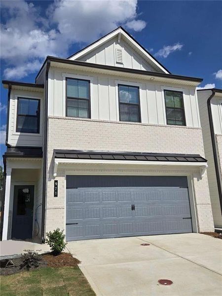 Front exterior of a new home in , Lawrenceville, GA, highlighting curb appeal (Image 29).