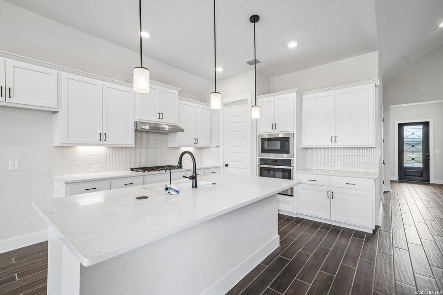 Furnished interior view inside a new home in Village at Three Oaks, Seguin (Image 9).