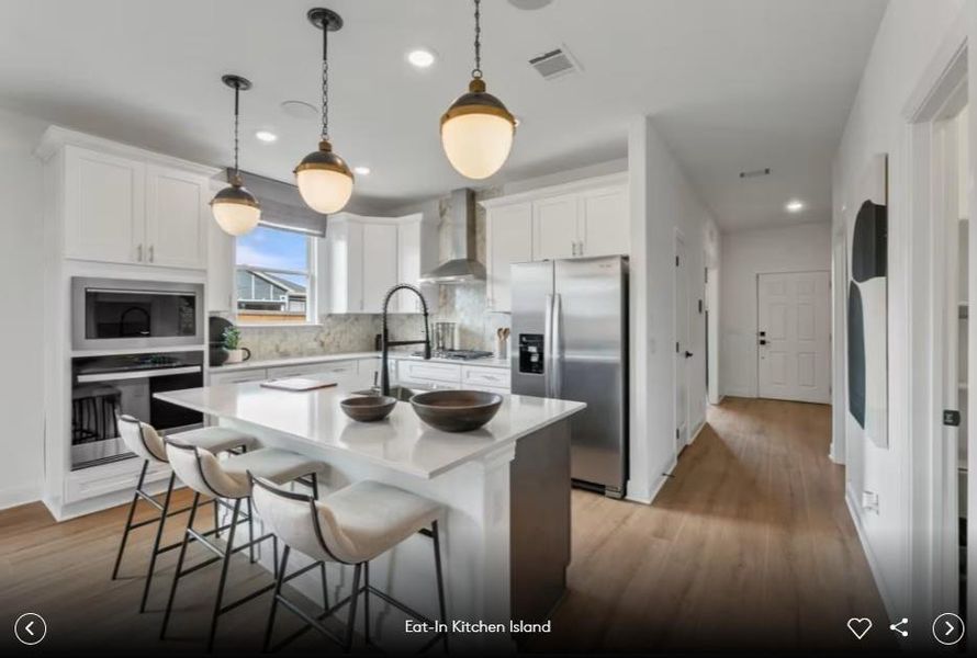 Interior photos- Photo of Pulte model home with same floor plan, not of actual home listed.