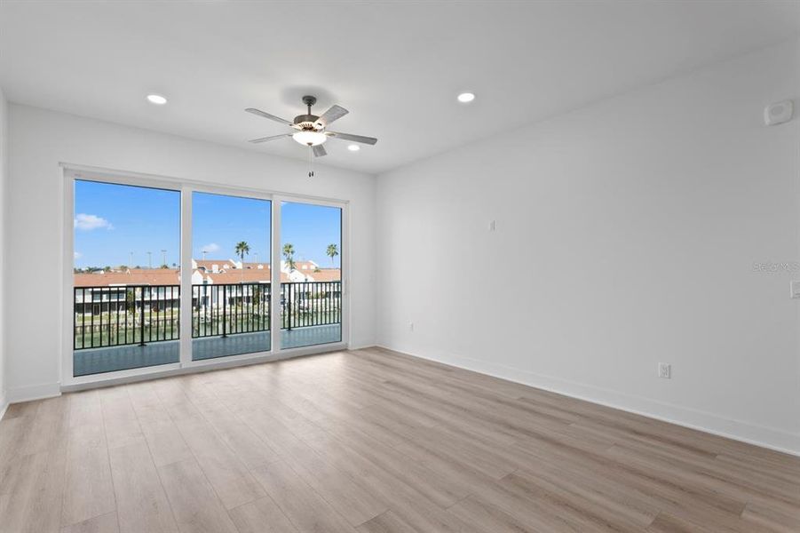 Spacious, unfurnished interior of a new home in Residences at Town Center, Madeira Beach (Image 22).