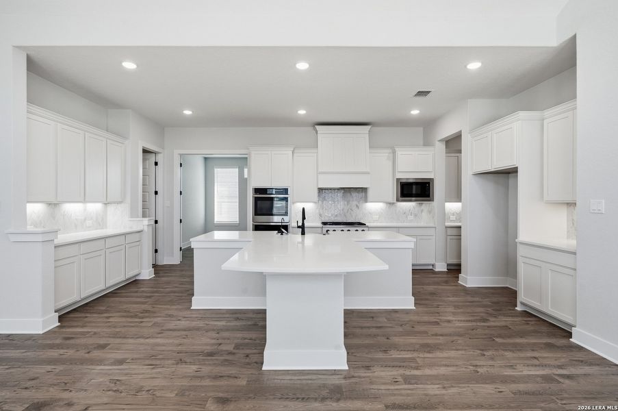 Furnished interior view inside a new home in Potranco Oaks, Castroville (Image 17).