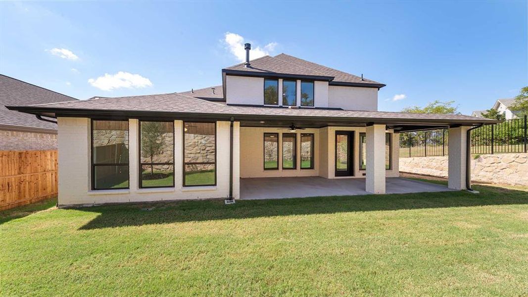 Exterior details and patio area of a home in The Heights At Uptown Celina 50', Celina (Image 2).