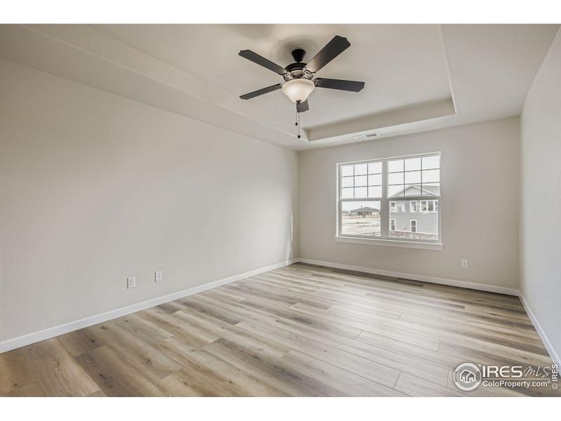 Spacious, unfurnished interior of a new home in RainDance National 60/70, Windsor (Image 21).