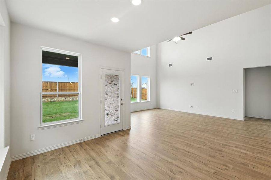 Unfurnished room featuring light wood finished floors, recessed lighting, and a ceiling fan
