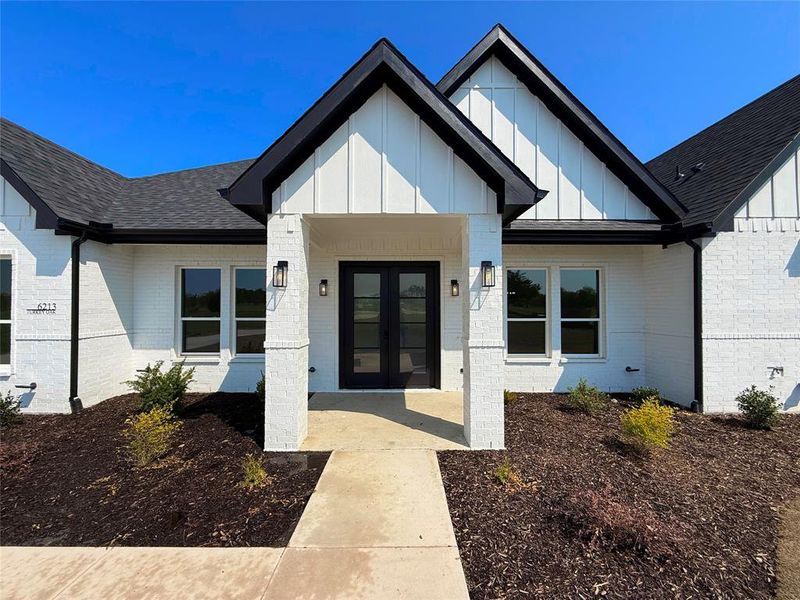 Front exterior of a new home in , Royse City, TX, highlighting curb appeal (Image 19). Front exterior of a new home in , Royse City, TX, highlighting curb appeal (Image 19).