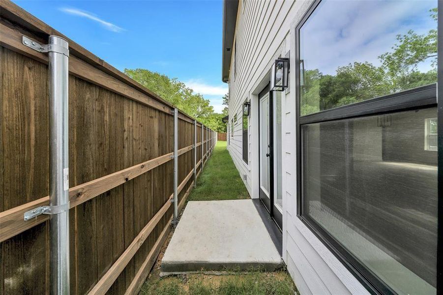Exterior details and patio area of a home in , Denison (Image 4).