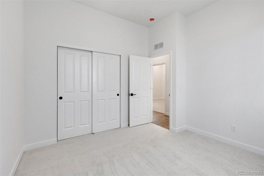 Spacious, unfurnished interior of a new home in Highlands Preserve, Mead (Image 25).